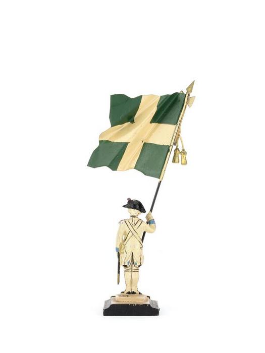 Porte-drapeau du régiment de Champagne, 1786, figurine militaire, 20ᵉ siècle, numéro d’inventaire 25445/7, Paris (Île-de-France), musée de l’Armée, © Paris (Île-de-France) – musée de l’Armée, dist. GrandPalaisRmn / Émilie Cambier, notice descriptive consultable en ligne.